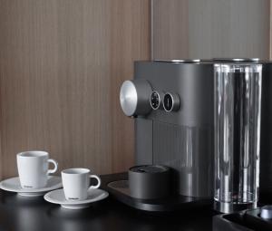 Příslušenství pro přípravu čaje a kávy v ubytování Ocak Hotel