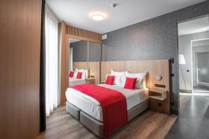 Postel nebo postele na pokoji v ubytování Ocak Hotel