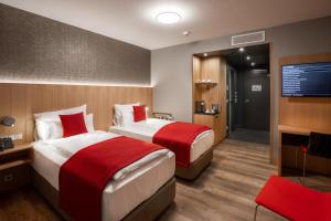 Postel nebo postele na pokoji v ubytování Ocak Hotel