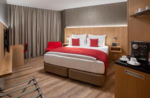 Postel nebo postele na pokoji v ubytování Ocak Hotel