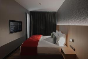 Postel nebo postele na pokoji v ubytování Ocak Hotel