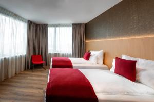 Postel nebo postele na pokoji v ubytování Ocak Hotel
