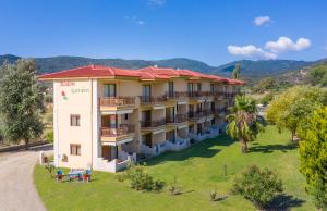 an aerial view of a hotel with mountains in the background at Rodon Garden in Sarti