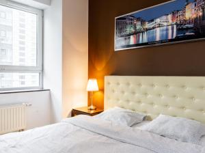 Postel nebo postele na pokoji v ubytování Platinum Towers Hotel Apartments