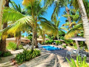 Majoituspaikassa Coco Cabañas and Casitas Vacation Rentals tai sen lähellä sijaitseva uima-allas