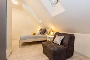Postel nebo postele na pokoji v ubytování Apartmány Jedovary