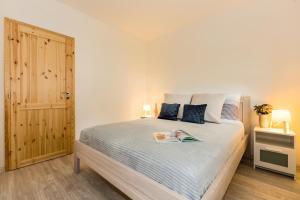 Postel nebo postele na pokoji v ubytování Apartmány Jedovary