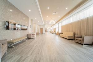 a hospital lobby with couches and a waiting room at TownePlace Suites by Marriott Brantford and Conference Centre in Brantford