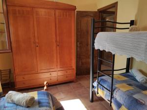 A bed or beds in a room at LOS ABUELOS