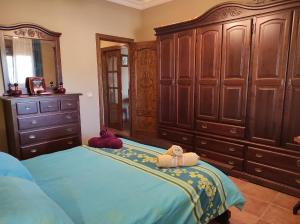 A bed or beds in a room at LOS ABUELOS