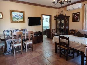 A television and/or entertainment centre at LOS ABUELOS