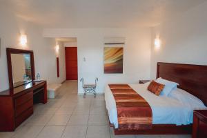 Postel nebo postele na pokoji v ubytování Hotel Boutique Casa Bella + 33 fotografií