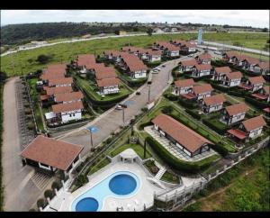 an aerial view of a house with a pool at Chalé Serrano in Bananeiras