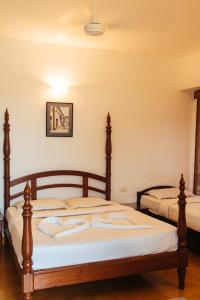Postel nebo postele na pokoji v ubytování Hotel Arcadia