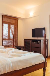 TV a/nebo společenská místnost v ubytování Hotel Arcadia