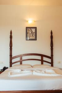 Postel nebo postele na pokoji v ubytování Hotel Arcadia