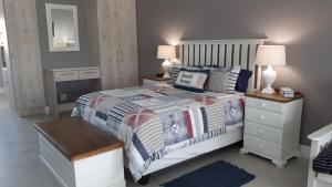 Postel nebo postele na pokoji v ubytování Settle inn Self Catering Units