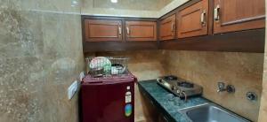 A cozinha ou cozinha compacta de Room in Guest room - Aggarwal Guest House In Cream Location