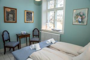 Ліжко або ліжка в номері Fuglsang Herregaard Hotel