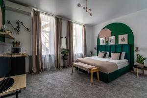 Кровать или кровати в номере La Cite Hotel