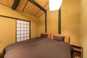 En eller flere senge i et værelse på Nodoka-an