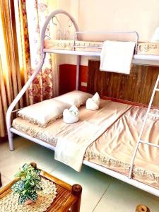 Dviaukštė lova arba lovos apgyvendinimo įstaigoje ROCCA Del GARDA Residences