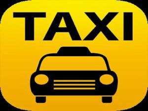 a yellow taxi sign with the word taxi at 2 King Beds with Taxi Meetgreet service in Thung Si Kan