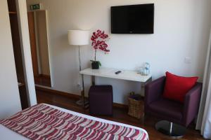 TV/Unterhaltungsangebot in der Unterkunft LBV House Hotel
