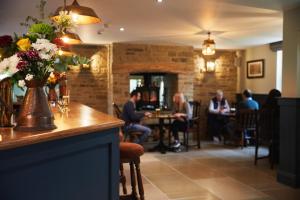 A restaurant or other place to eat at The Lime Tree Inn