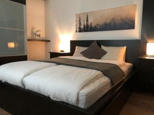 Postel nebo postele na pokoji v ubytování Löwenherz