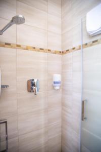 Ванная комната в 4 Évszak Hegyihotel