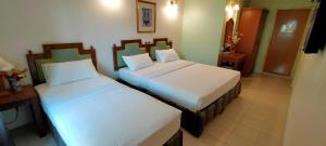 Postel nebo postele na pokoji v ubytování Hotel Johan