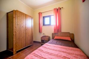 Katil atau katil-katil dalam bilik di Atlantico Sul