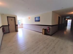 TV a/nebo společenská místnost v ubytování Apple Suites Hotel