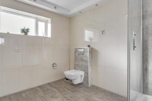 A bathroom at Guesthouse Vatnsholt