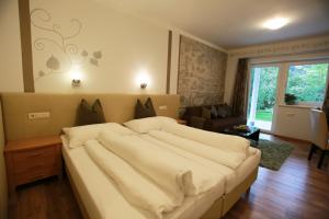 Postel nebo postele na pokoji v ubytování Apart Garni Monte Vera