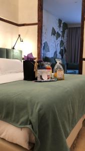 
Cama o camas de una habitación en Hotel Boutique Adolfo
