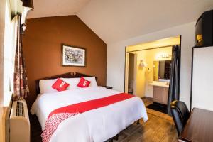 Ein Bett oder Betten in einem Zimmer der Unterkunft OYO Hotel Decatur TX Hwy 287 Northwest