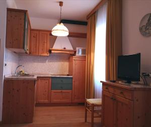 Kuchyňa alebo kuchynka v ubytovaní Residence Capriolo