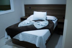 Cama o camas de una habitación en Sokulski Flat Hotel e Restaurante