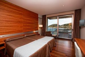 Postel nebo postele na pokoji v ubytování Hotel Ego + 37 fotografií