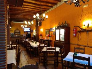 Restaurant o un lloc per menjar a Hotel Corona de Atarfe