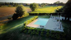 an aerial view of a house with a swimming pool at Room&Breakfast Villa Angela in Sala Baganza