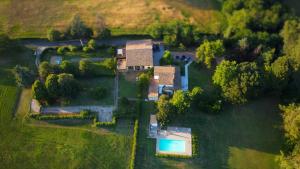 an aerial view of a house in a field at Room&Breakfast Villa Angela in Sala Baganza