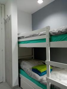 a couple of bunk beds in a room at Alfastudio in Breuil-Cervinia