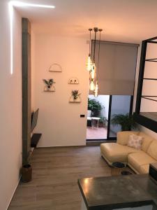 A seating area at Moderno Loft a 150 metros de la playa