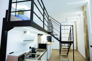 A kitchen or kitchenette at Moderno Loft a 150 metros de la playa