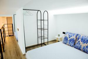 A bed or beds in a room at Moderno Loft a 150 metros de la playa