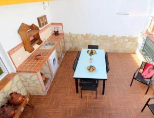 Kuchyňa alebo kuchynka v ubytovaní Casa María en el centro Nerja