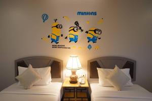 Postel nebo postele na pokoji v ubytování BCP Hotel